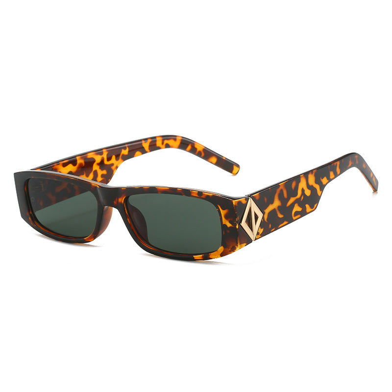 Ladies fashionable sunglasses with asymmetrical frame and gold-colored details Bowlift