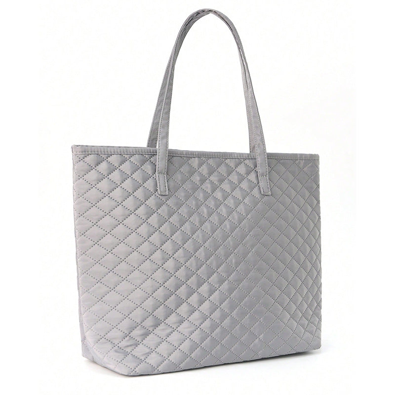 Fashionable handbag made of textured material Bowlift