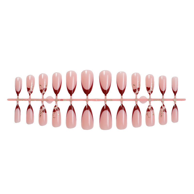 Elegant Stiletto Press-On Nail Set with Decorative Gold Accents Bowlift