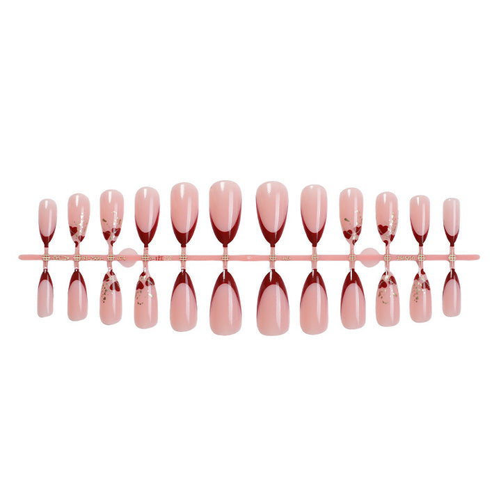 Elegant Stiletto Press-On Nail Set with Decorative Gold Accents Bowlift