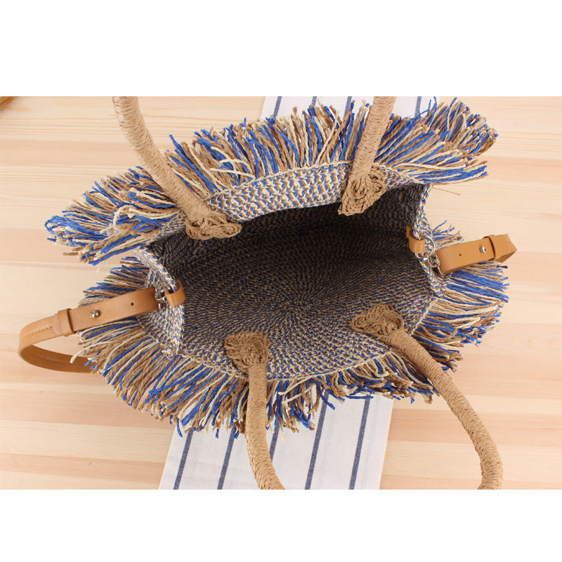 Round Bast shoulder bag with fringes and leather handles Bowlift