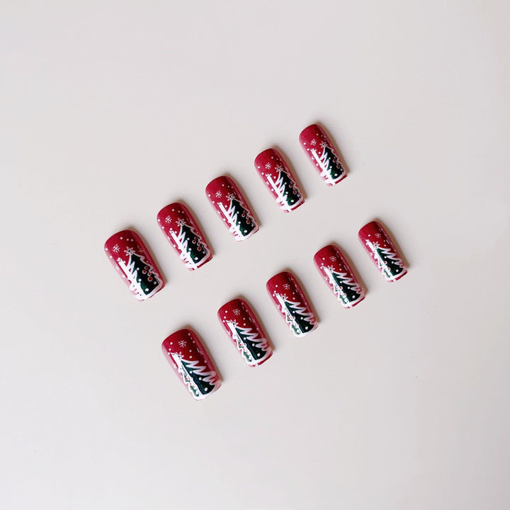 Artificial nail set with festive Christmas designs and glitter accents Bowlift
