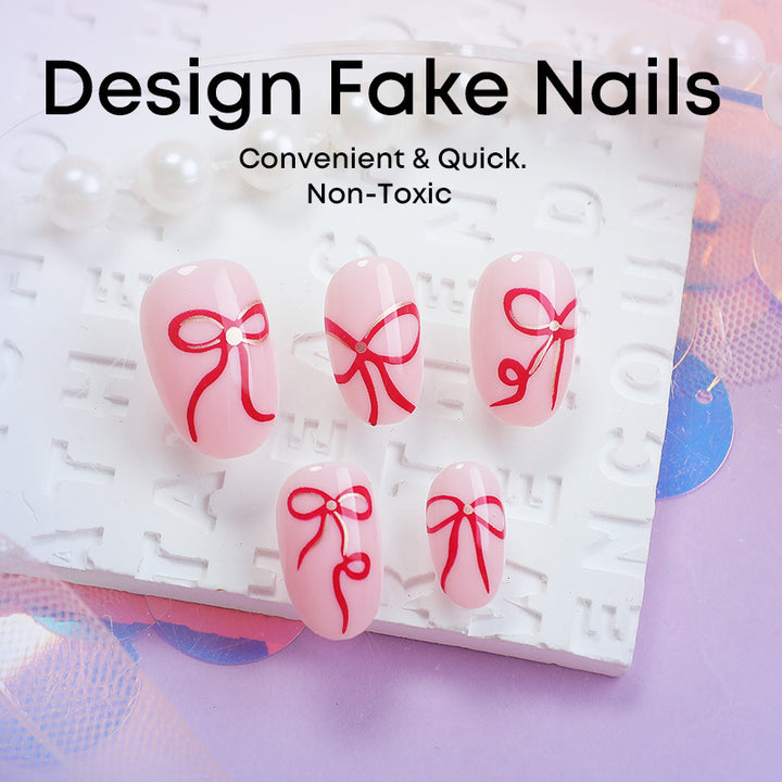 Artificial nail design with bow motifs Bowlift