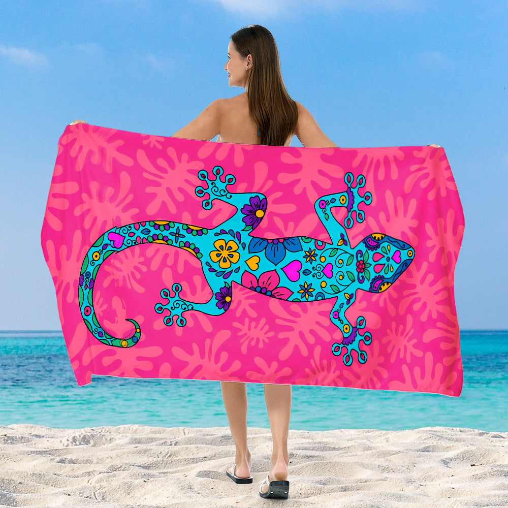 Beach towel with vibrant, colorful animal motif Bowlift