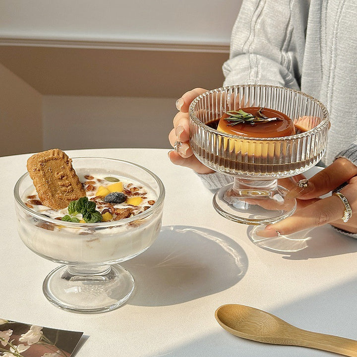 Footed glass dessert bowl with wide rim pedestal base for serving and display Bowlift