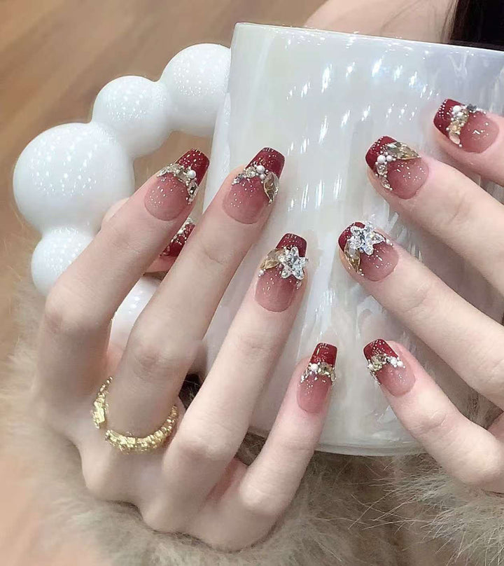 Decorative Long Stiletto Press-On Nails with Heart and Floral Accents Bowlift