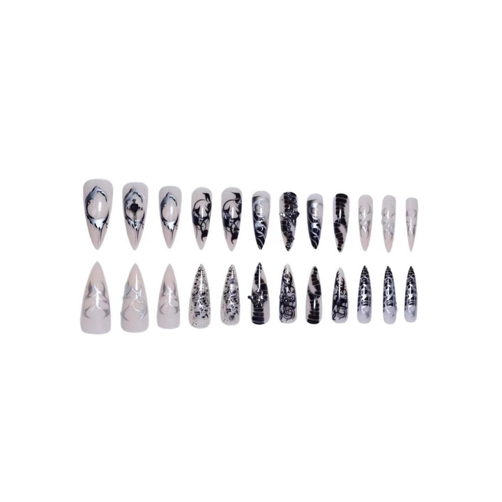 Artistic Stiletto Nail Enhancements with Intricate Patterns Bowlift