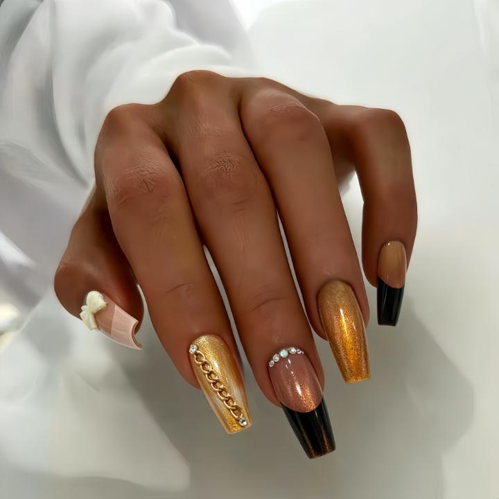 Glamorous artificial nails with glittering design and elegant embellishments Bowlift
