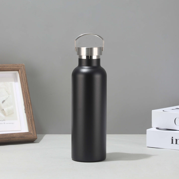 Women's stainless steel insulated drinking bottle with sustainable bamboo lid Bowlift