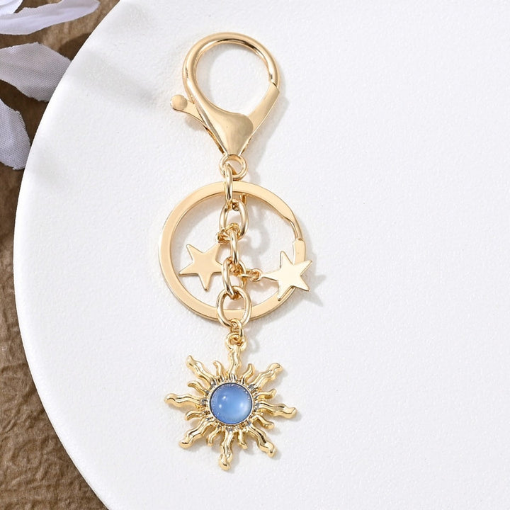 Keychain with Sparkling Sun Motif Bowlift