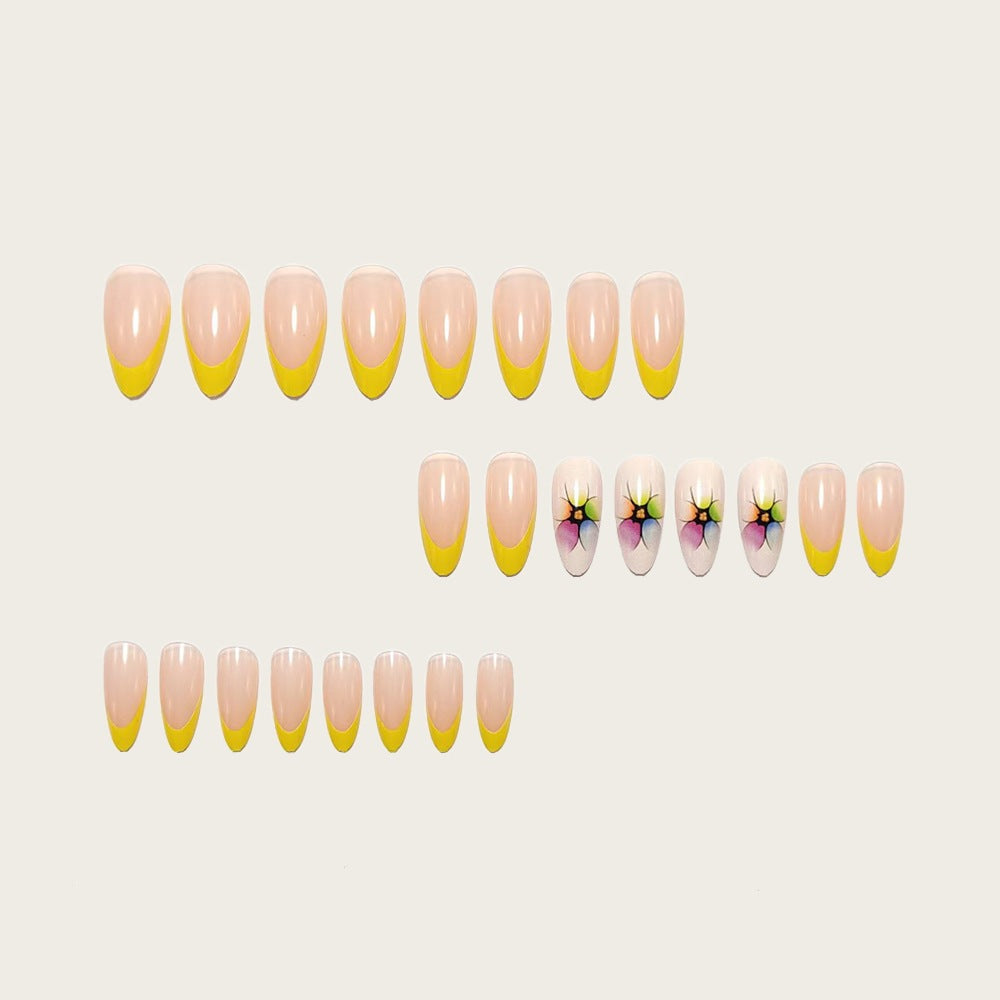 Artificial nails with colorful floral designs and striking color accents Bowlift