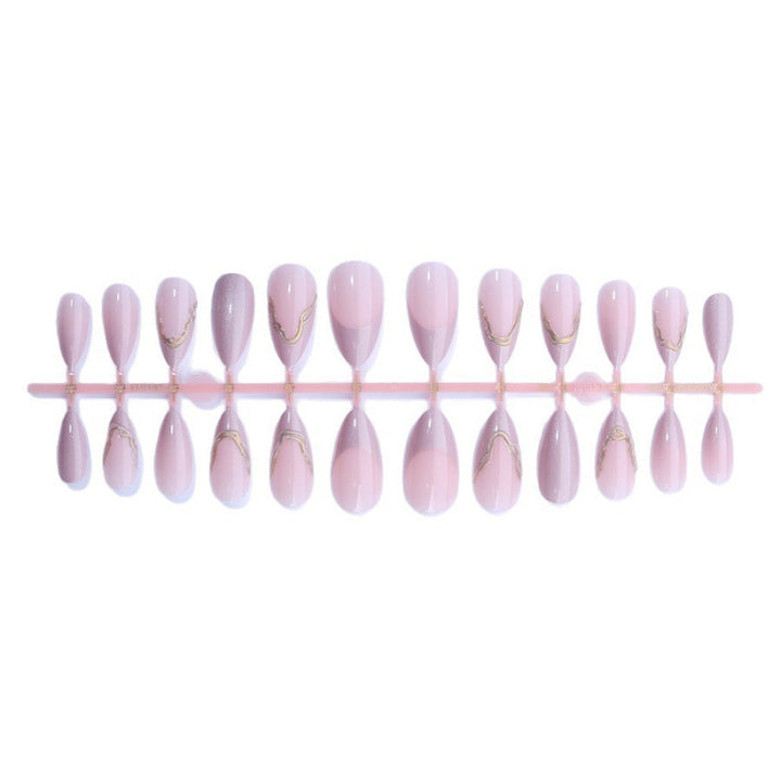 Acrylic nail set with glamorous tips and golden accents Bowlift