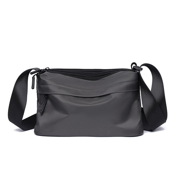 Practical shoulder bag with multiple compartments Bowlift
