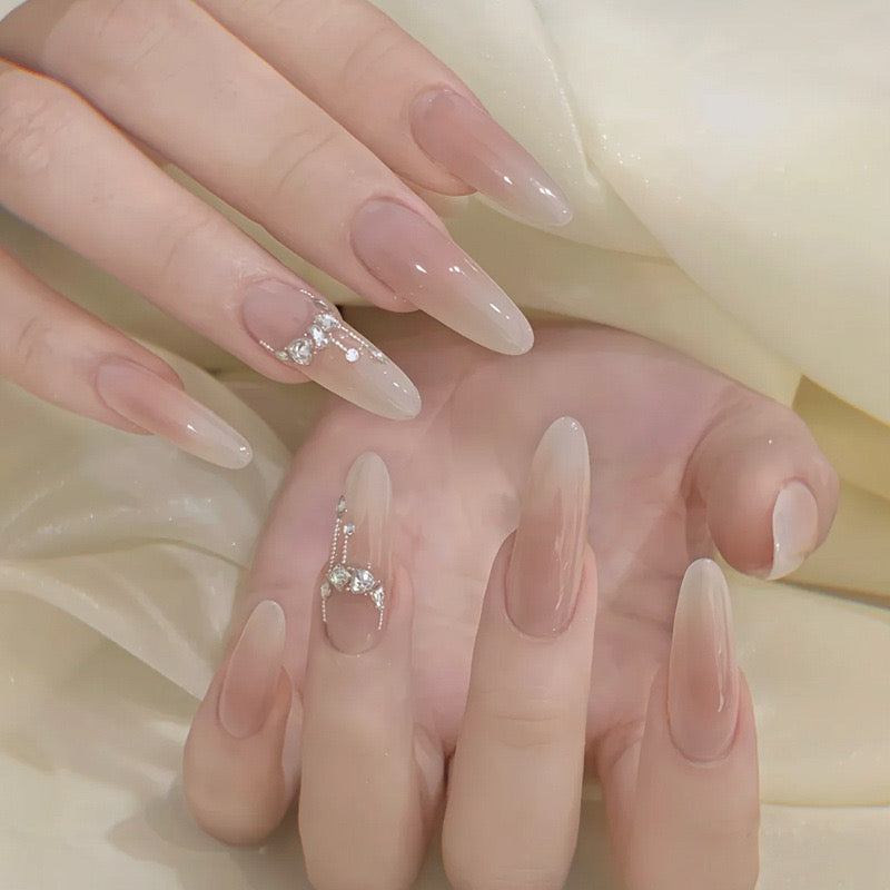 Artificial nails with glamorous decor Bowlift