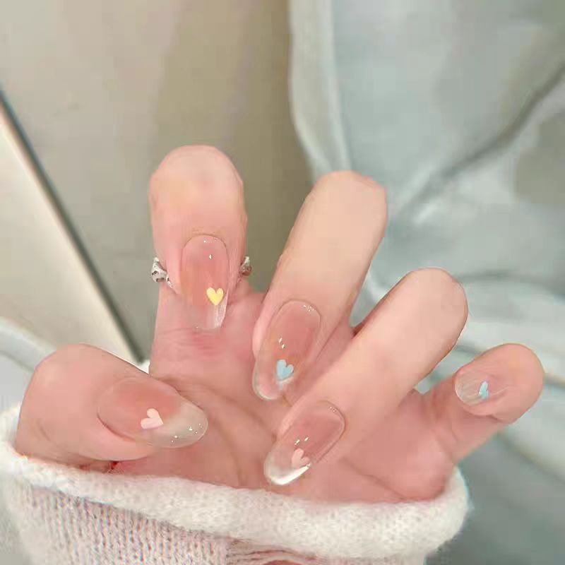 Artistic Press-On Nail Set with Floral and Heart Designs Bowlift