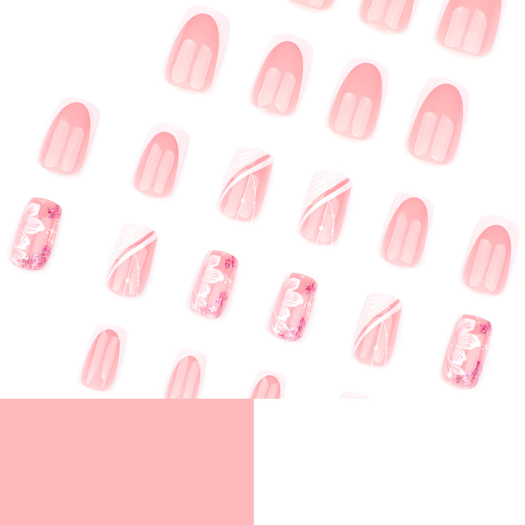 Artful Nail Art with Elegant French Tips and Floral Accents Bowlift