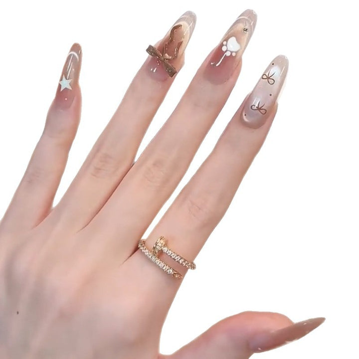 Glamorous artificial nails with creative embellishments Bowlift