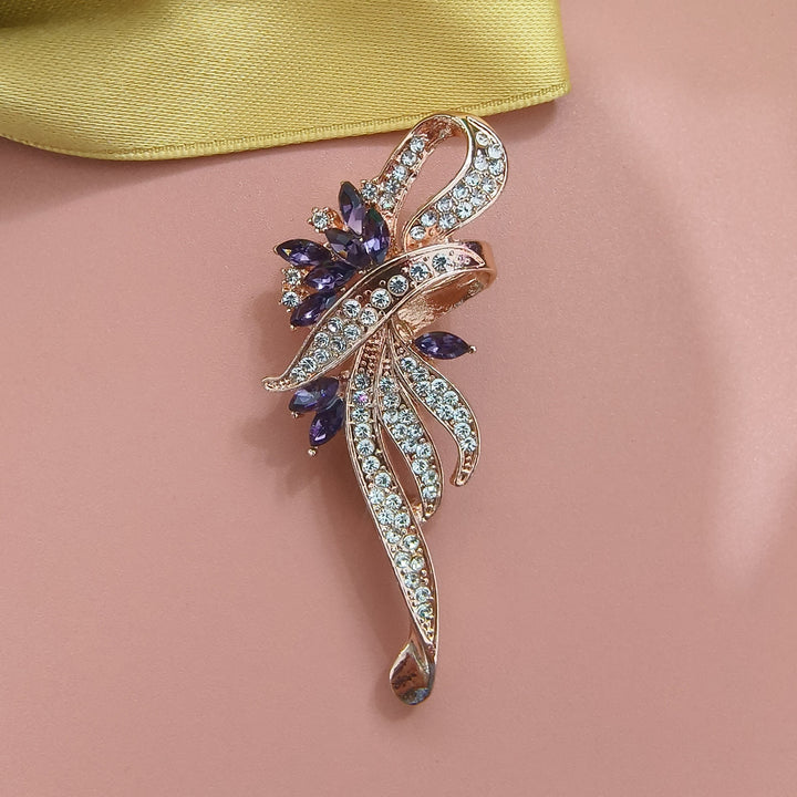 Exquisite brooch with sparkling zirconia and blue gemstones Bowlift