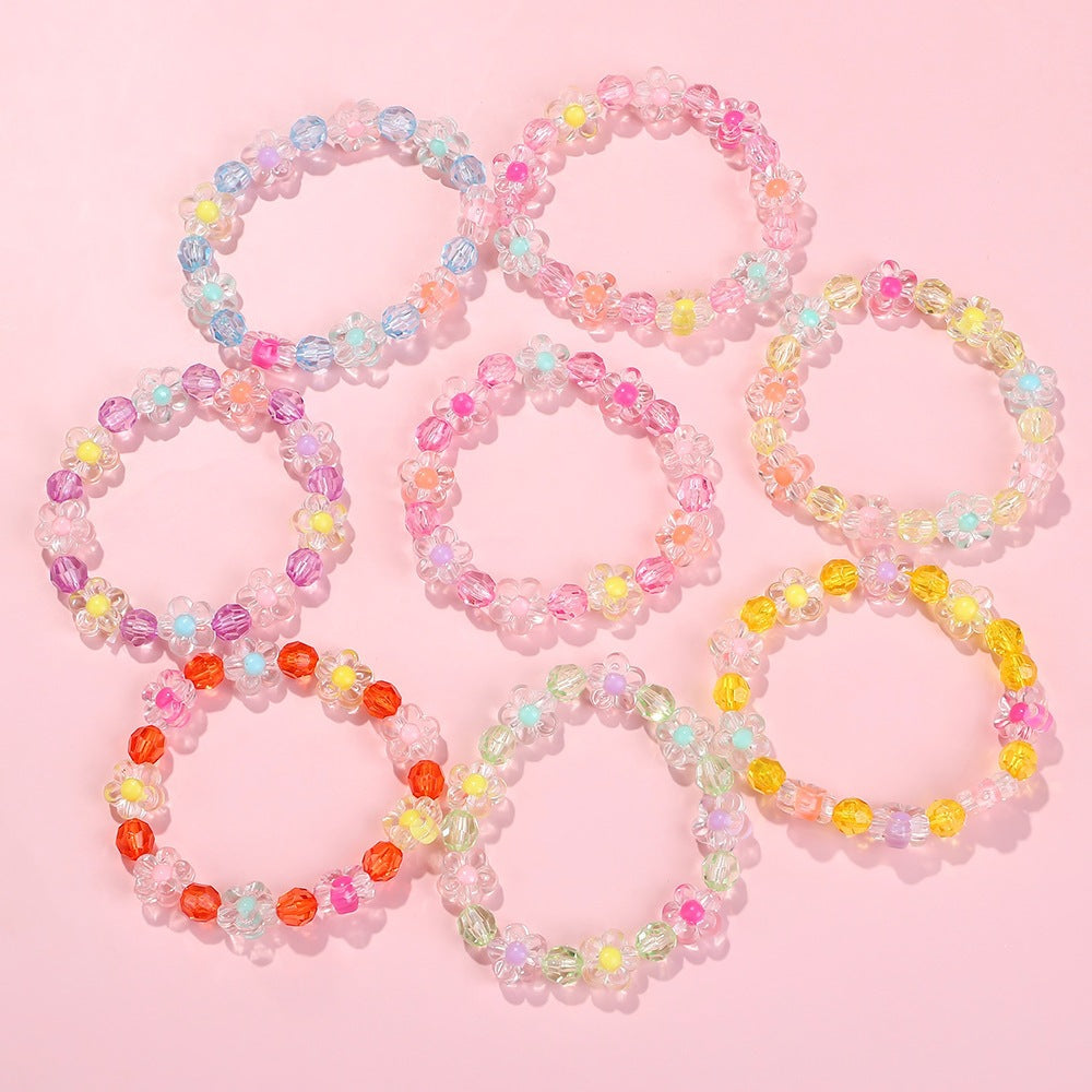 Friendship bracelet with colorful flower motifs Bowlift
