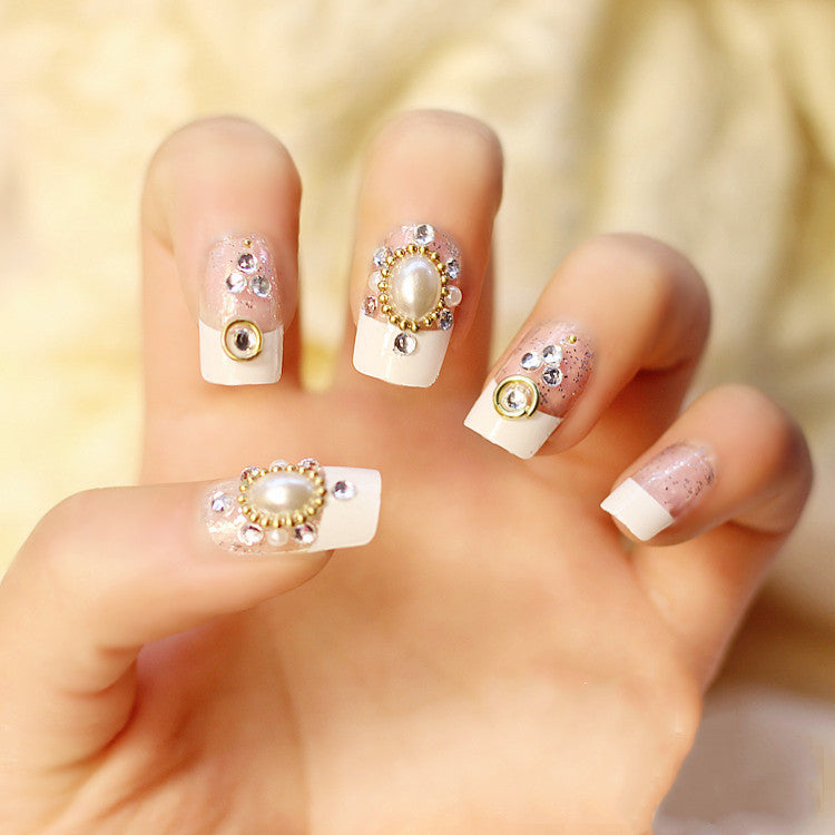 Artificial nails with elegant flower and rhinestone design Bowlift
