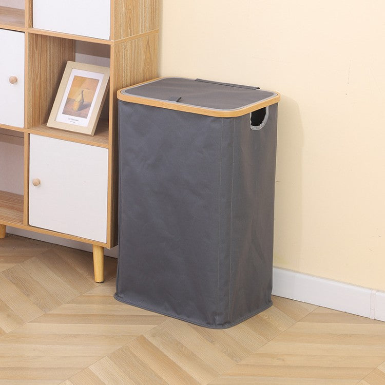 Stylish laundry basket with wooden lid Bowlift