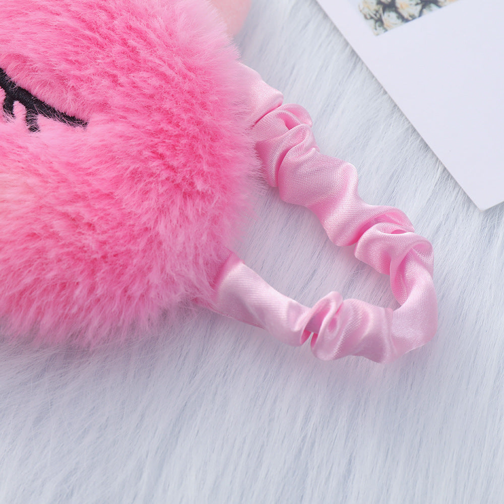 Women's plush-filled unicorn sleep mask with 3D horn, embroidered eyelashes and adjustable satin band Bowlift