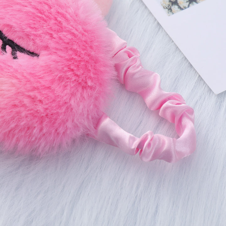 Women's plush-filled unicorn sleep mask with 3D horn, embroidered eyelashes and adjustable satin band Bowlift