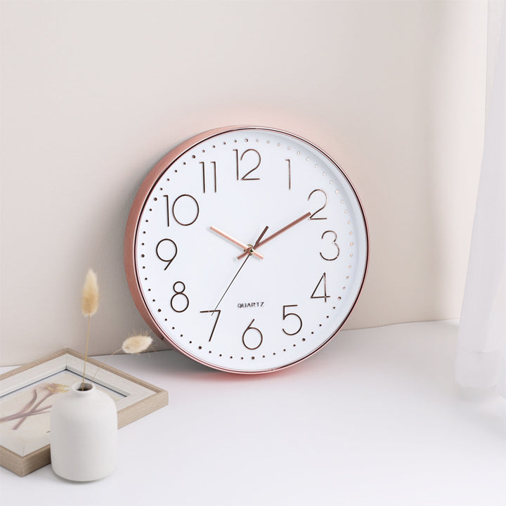 Wall clock in minimalist design Bowlift