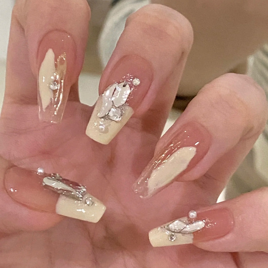 Glamorous artificial fingernails with glitter and moon designs Bowlift
