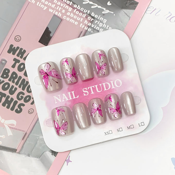 Artistic and elegant artificial nails with butterflies Bowlift