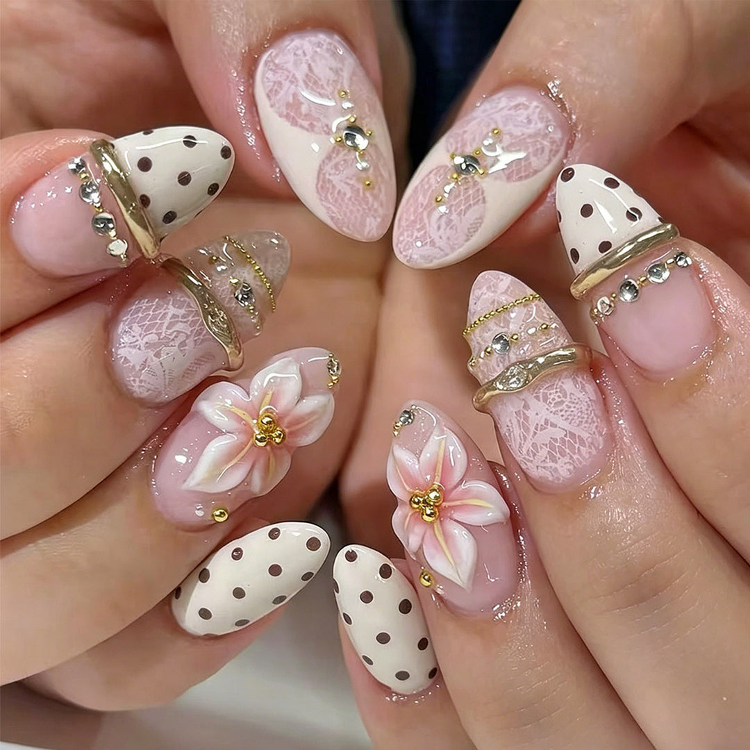 Artful Nail Extensions with Elegant Floral and Glitter Accents Bowlift