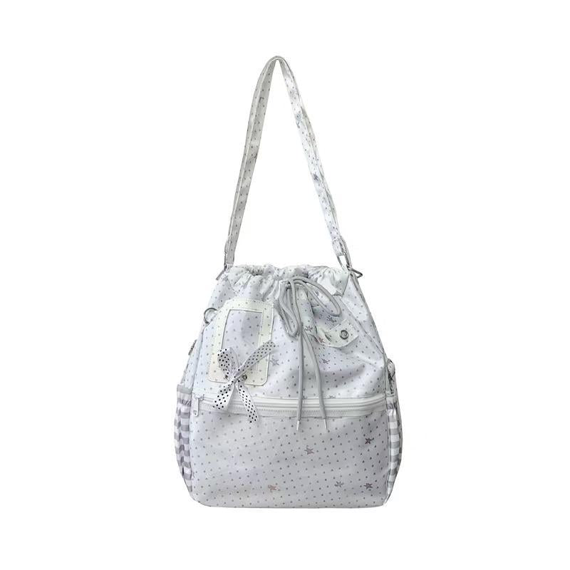 Shoulder bag with practical compartments and playful design Bowlift