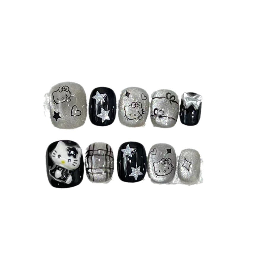 Fun and Whimsical Press-On Nail Set with Cartoon Accents Bowlift