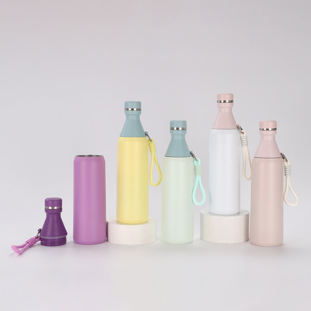 Ladies insulated drinking bottle with practical carrying strap Bowlift