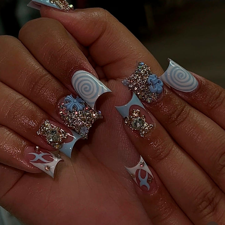 Artful nail art with cute animal motifs and glitter accents Bowlift