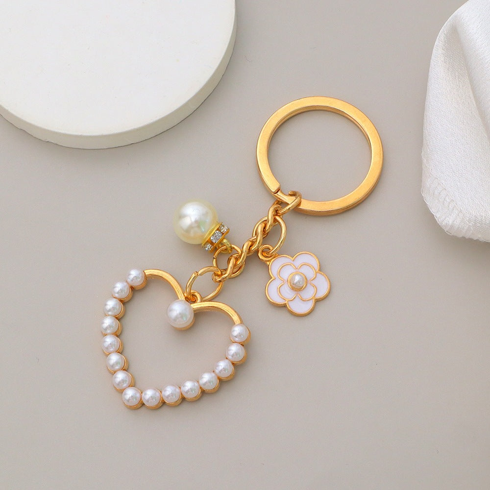 Keychain with heart and flower motif Bowlift