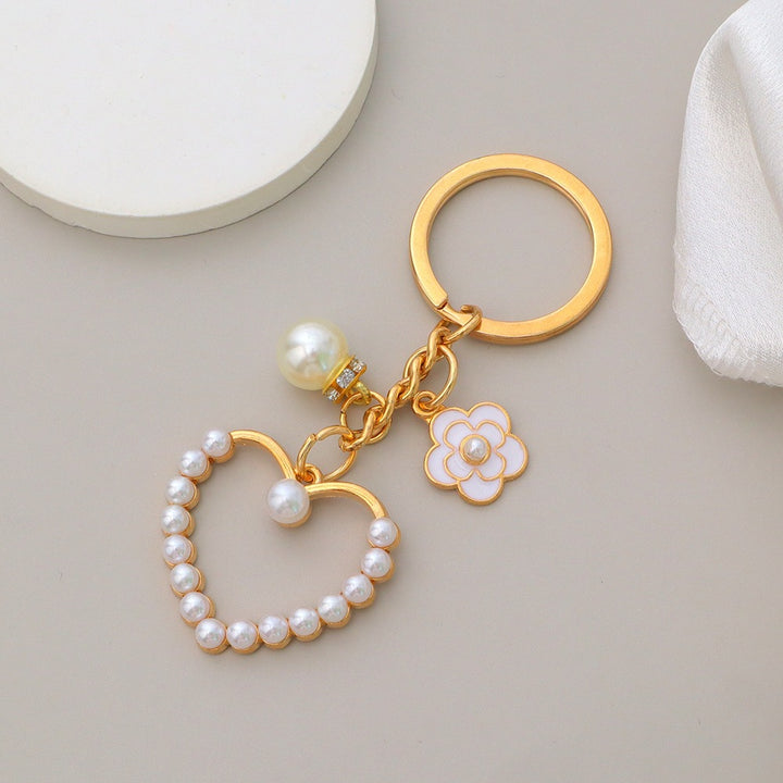 Keychain with heart and flower motif Bowlift