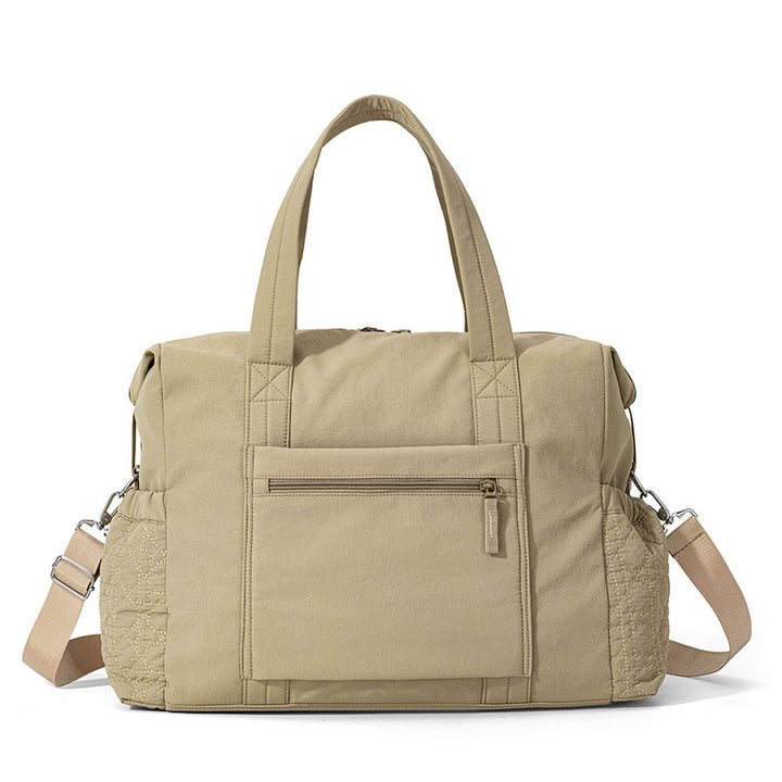 Sporty travel bag with innovative compartment design Bowlift