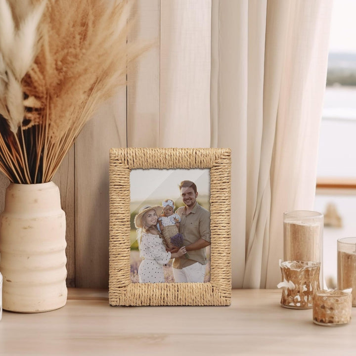 Artful picture frame made of woven natural material Bowlift