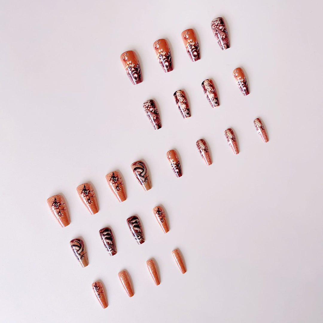 Elegant artificial nail set with 3D dragon designs and gold accents Bowlift