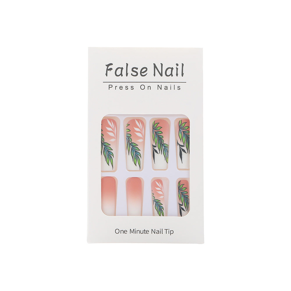 Artificial nails with elegant ombre design and floral accents Bowlift