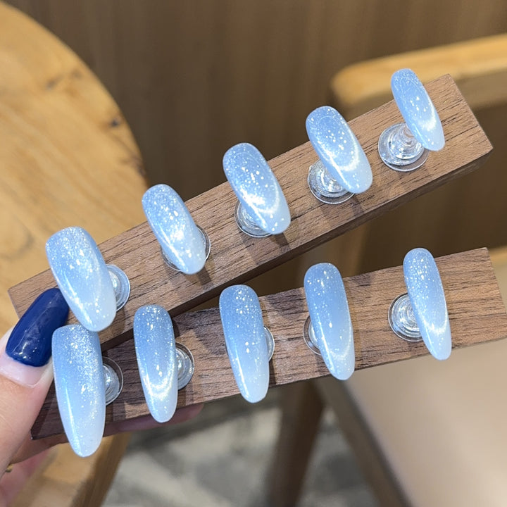 Glamorous artificial nails with glitter gradient Bowlift