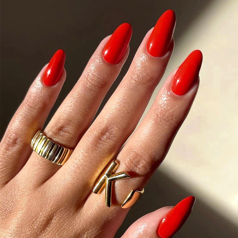Artful nail designs with a matte finish and elegant stiletto shape Bowlift