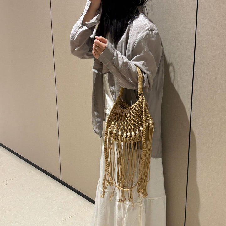 Hand-knotted shoulder bag with tassels Bowlift