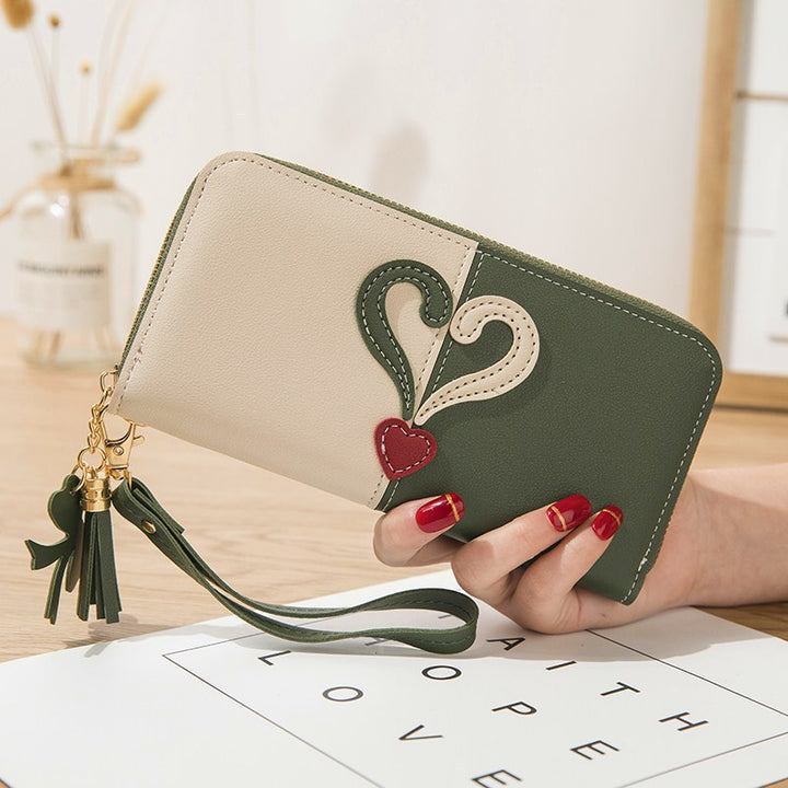 Stylish wallet with heart appliqués Bowlift