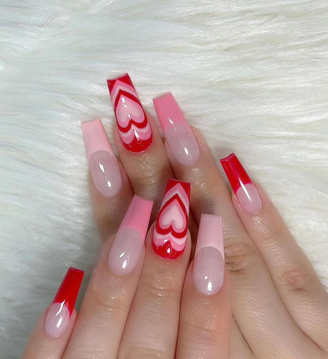 Artistic acrylic nails with heart design Bowlift