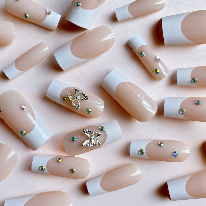 Elegant Stiletto Nail Extensions with Rhinestone Accents Bowlift