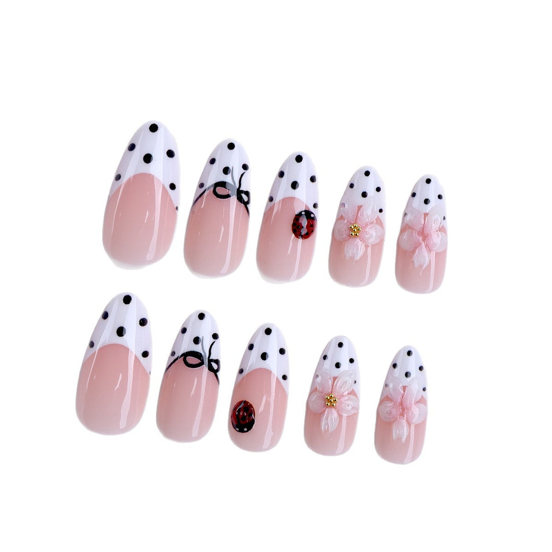 Artificial nail art with floral and playful accents Bowlift