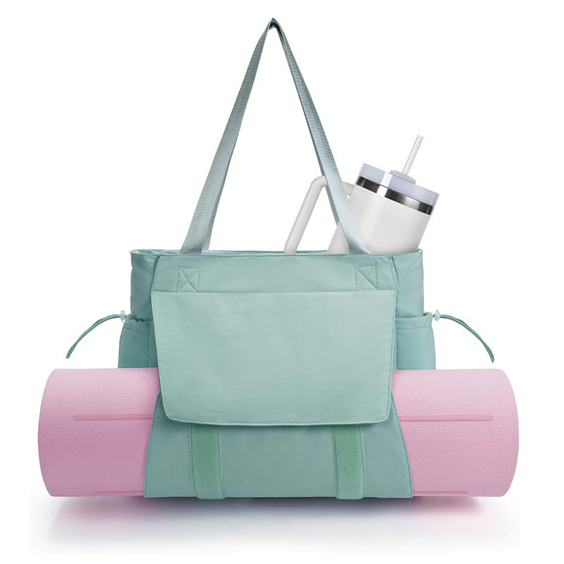 Versatile sports bag with separate yoga mat carrying compartment Bowlift