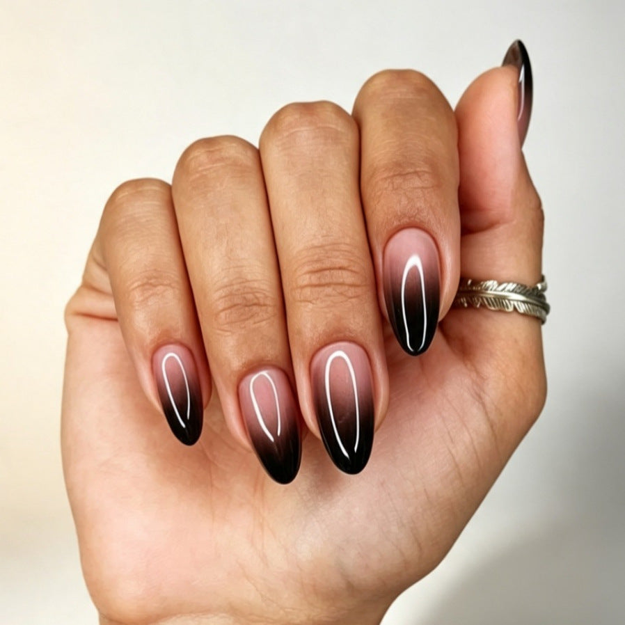 Artificial nails with elegant ombre design and filigree edge Bowlift